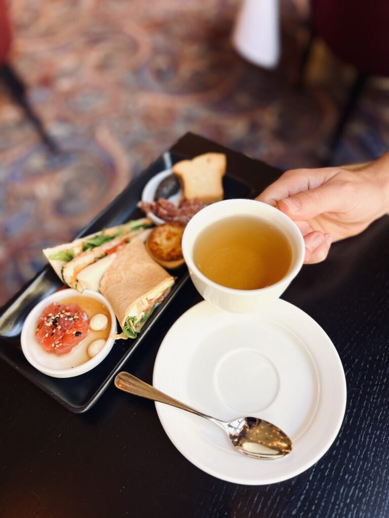 Canalside walk finishing with high tea at Hotel Des Indes